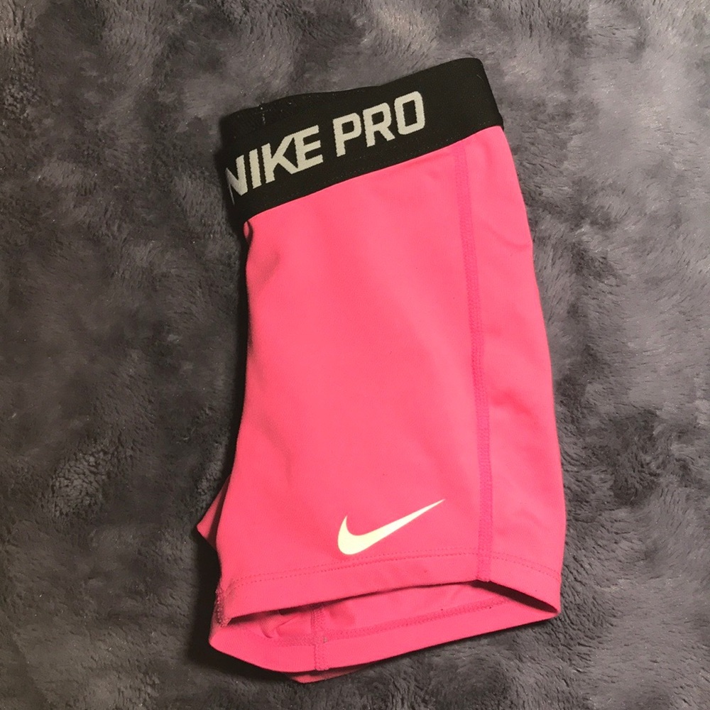 Pink Nike pros youth small